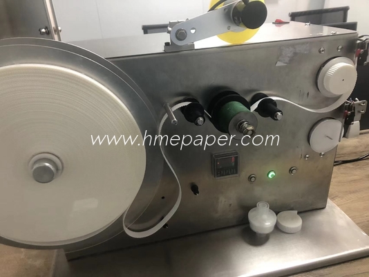 comprare Macchina di avvolgimento automatico del nastro di carta filtro HME SUS304 Taglio manuale del nastro controllato da PLC online manufacture